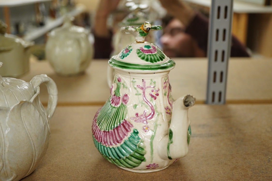 A rare Staffordshire saltglaze stoneware teapot, mid 18th century, an early 19th Wedgwood stoneware teapot and a stoneware butter tub and cover - 13cm wide (3)